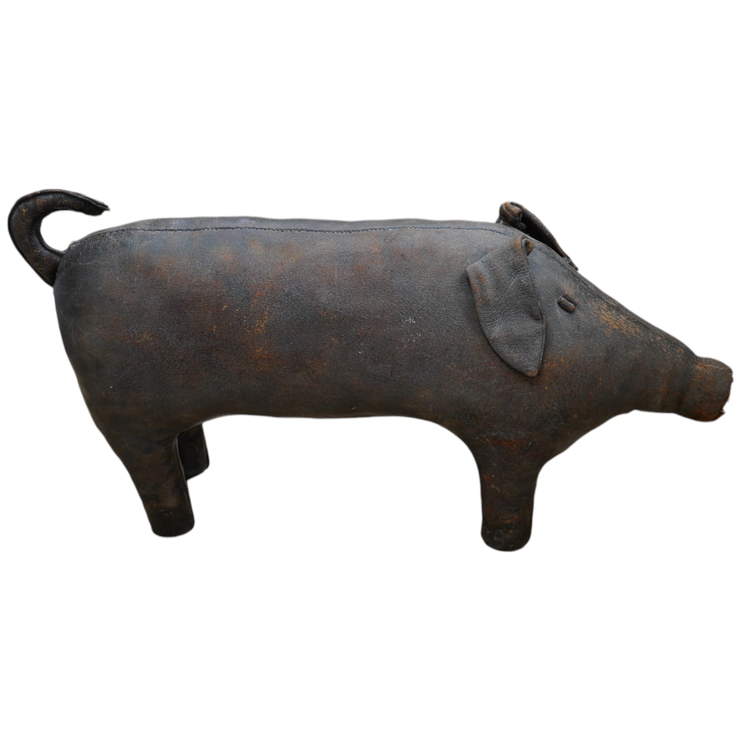 A Liberty brown leather pig foot stool, 90cm long. Condition - the end of the tail and snout are missing and generally leather scuffed